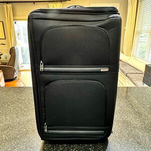 Tumi Black Travel Suitcase